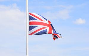 A British soldier with 1st Battalion, The Rifles, 160 Brigade, lowers the flag of Great Britain during the Exercise Steppe Eagle 17 closing ceremony Aug. 4, 2017, at Illisky Training Center near Almaty, Kazakhstan. Exercise Steppe Eagle is a premier multinational exercise focused on peacekeeping and peace support operations, while building relationships and mutual understanding between partner nations.