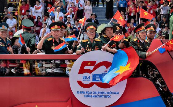 Vietnamese veteran soldiers take part in a parade during the 50th anniversary celebration of the end of the Vietnam War Wednesday, April 30, 2025, in Ho Chi Minh City, Vietnam. (AP Photo/Richard Vogel)