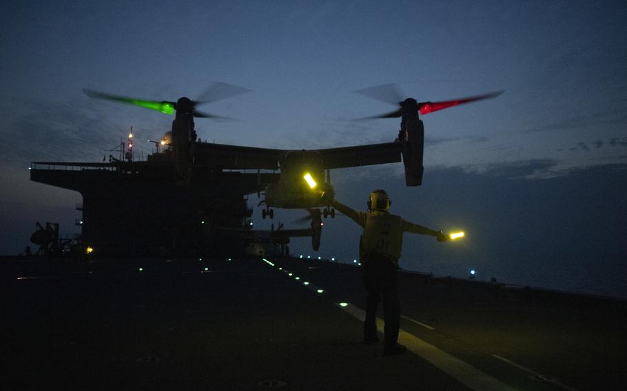 Sailors conduct night operations with MV-22 Osprey aircraft assigned to Marine Medium Tiltrotor Squadron 161 aboard the Expeditionary Sea Base USS Hershel “Woody” Williams, Nov. 11, 2021. While the Marine Corps quietly ceased rotations of the task force known as SPMAGTF-Crisis Response-Central Command, Ospreys remain a vital part of the service’s crisis response plans. 