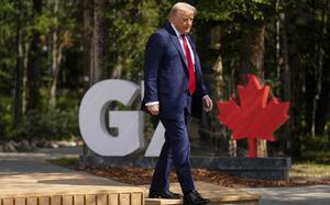 President Donald Trump walks during the official welcome of the G7 Summit, Monday, June 16, 2025, in Kananaskis, Canada. (AP Photo/Mark Schiefelbein)