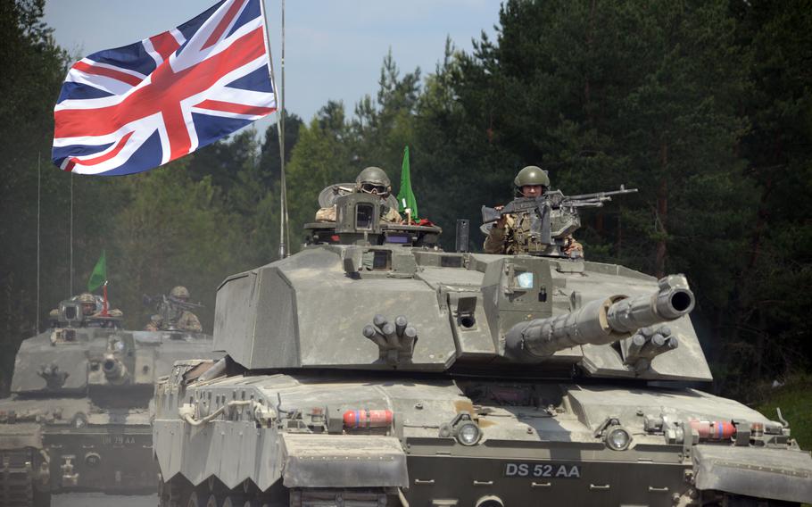 British soldiers take part in the Strong Europe Tank Challenge at Grafenwoehr Training Area in Germany in 2018. The United Kingdom is prepositioning hundreds of tanks and fighting vehicles in Germany to enable its forces to maneuver more freely around Europe.
