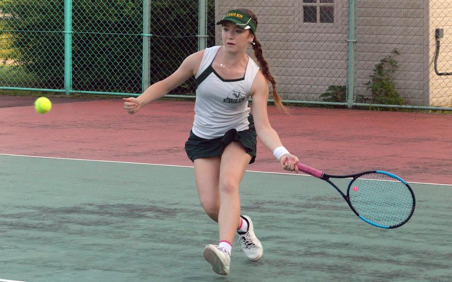 Robert D. Edgren's Jenna Mahoney readies a forehand return during Friday's DODEA-Japan tennis matches. Mahoney beat Nile C. Kinnick's Hannah Yi 8-2 and teamed with Caitlyn Carroll to beat Yi and Hannah Nguyen 6-0.