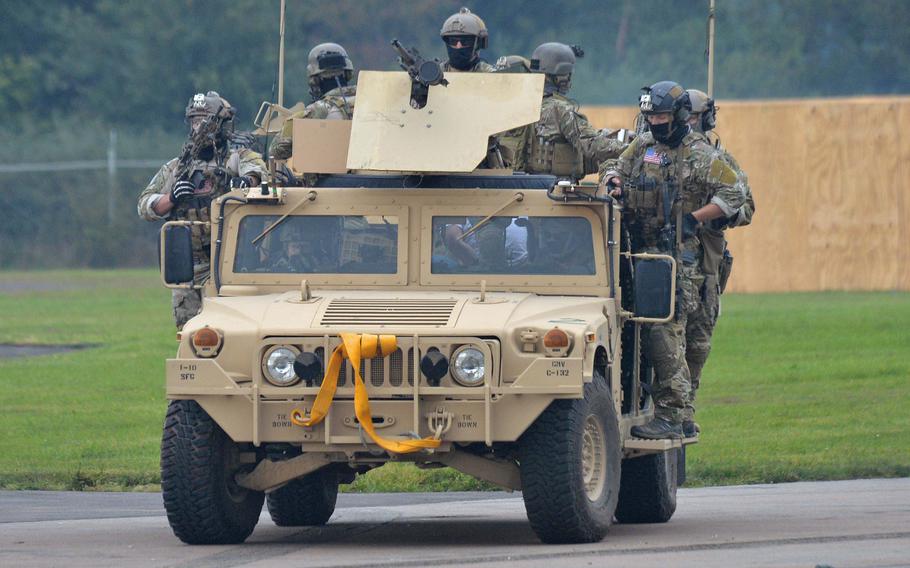 Special operators speed away during an exercise hosted by the U.S. Special Operations Command Europe at Baumholder, Germany, in 2014. A push to transform Baumholder into a special operations hub is slated to get a $64 million funding boost in the Defense Department's 2024 budget. 