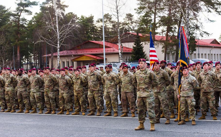 Soldiers of an airborne brigade of the U.S. Army stand at the Adazi Military Base of the Latvian armed forces in Adazi, Latvia, on Friday, Feb. 25, 2022, upon arrival for their mission to strengthen the NATO enhanced Forward Presence multinational battlegroup. 