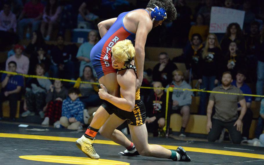 Stuttgart’s Jack Gruver tries to take down Ramstein’s Matthew Rutlege in the 190-pound championship match at the DODEA-Europe wrestling finals in Wiesbaden, Germany. Gruver beat Rutlege to take the 2024 title.