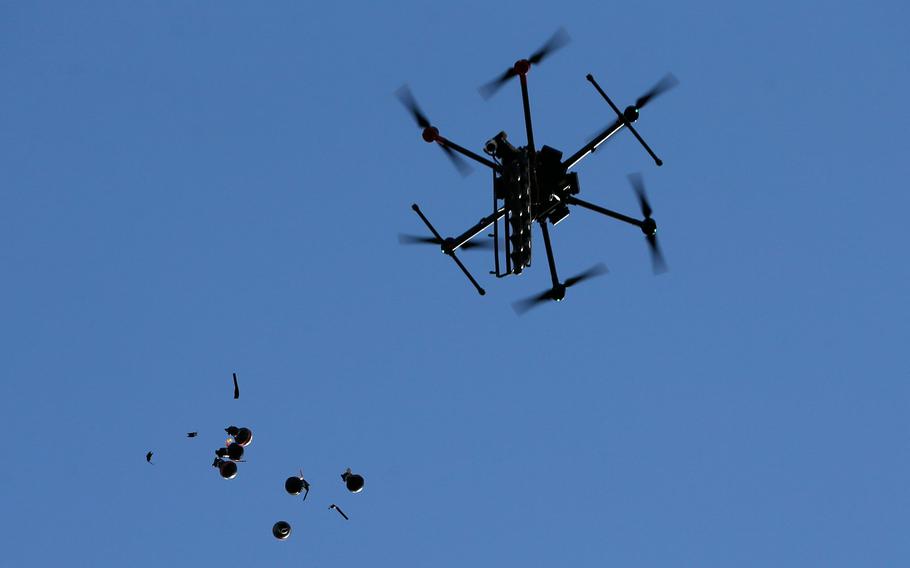 An Israeli drone releases stun grenades on Palestinians demonstrating against the latest tensions in Jerusalem and the occupied West Bank as well as the bombing of the Gaza Strip by Israel, on May 16, 2021, near the settlement of Beit El not far from Ramallah. Israeli strikes killed 42 Palestinians in the Gaza Strip today, the worst daily toll yet in almost a week of deadly clashes, as the UN Security Council met amid global alarm at the escalating conflict.