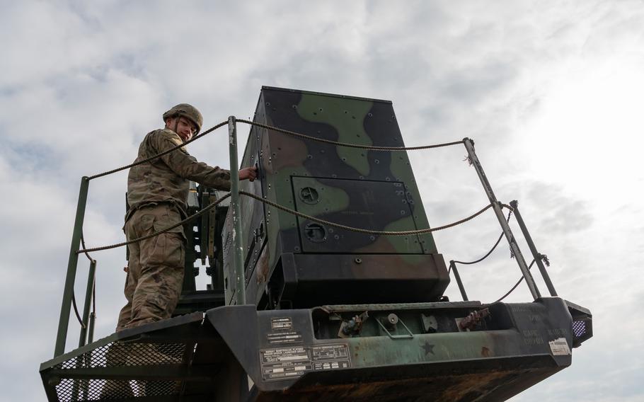 Pfc. Jacob Root inspects a Patriot missile launching station in southeast Poland at the beginning of his shift March 7, 2023. Delta Battery soldiers usually work 12-hour shifts and rarely leave their job site.
