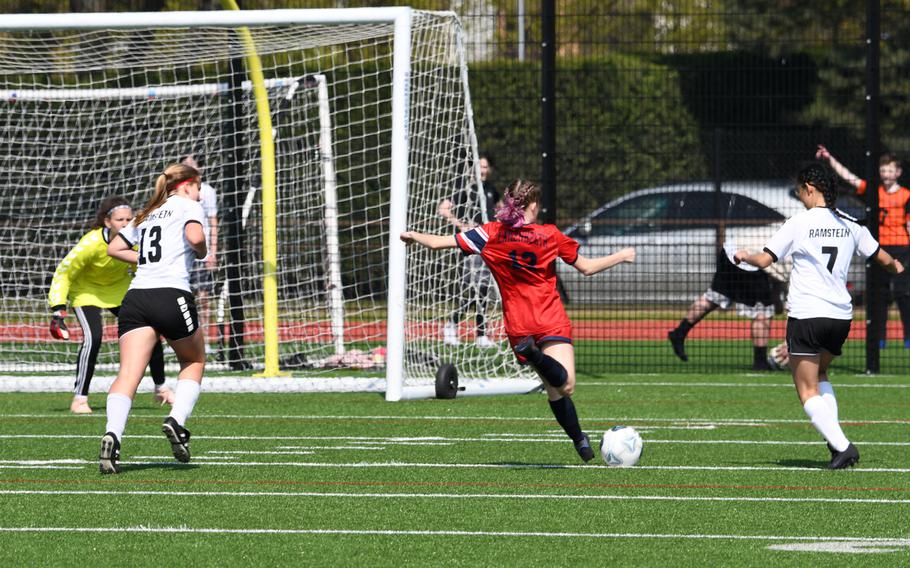 Lakenheath's Heidi Amberson breaks the defense and takes a shot Saturday, April 16, 2022, in a game against Ramstein at RAF Lakenheath in England.