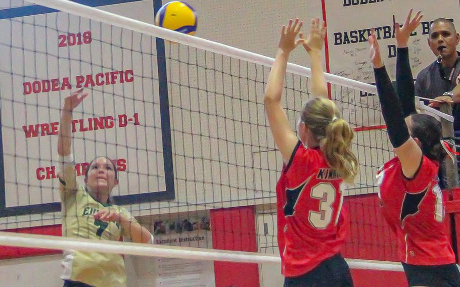 Kaiya Pasion spikes the ball.