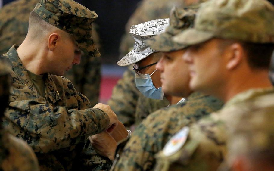 U.S. and Filipino troops attend the Balikatan exercise's opening ceremony at Camp Aguinaldo in Quezon city, northeast of Manila, Tuesday, April 11, 2023.