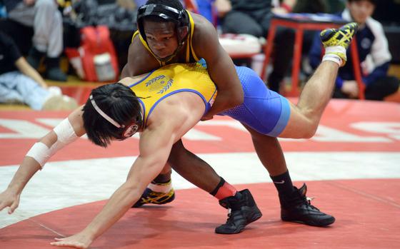 ASIJ 133-pounder Cadell Lee brough a Virginiia state championship with him to the Pacific.