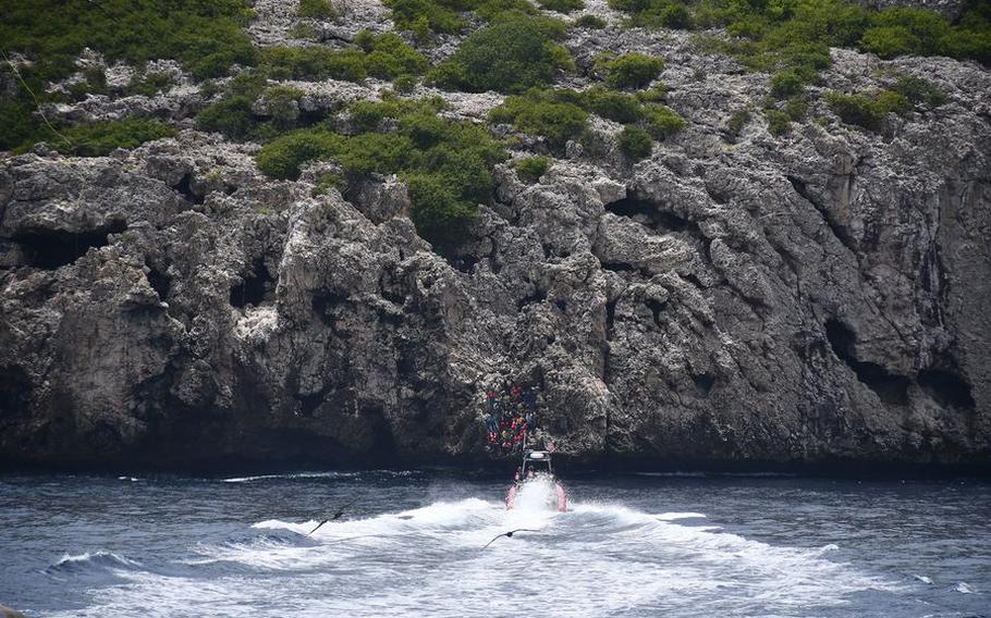 The Coast Guard Cutter Winslow Griesser rescues 48 Haitian migrants stranded on Monito Cay, Puerto Rico, in the Mona Passage Aug. 12, 2021. 