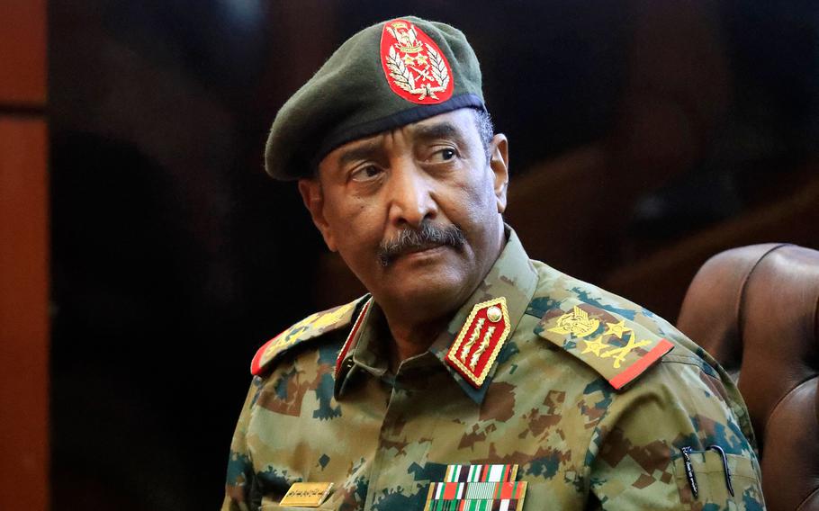 Sudan’s top army general Abdel Fattah al-Burhan holds a press conference at the General Command of the Armed Forces in Khartoum on Oct. 26, 2021. Angry Sudanese stood their ground in street protests against a coup, as international condemnation of the military’s takeover poured in ahead of a UN Security Council meeting.