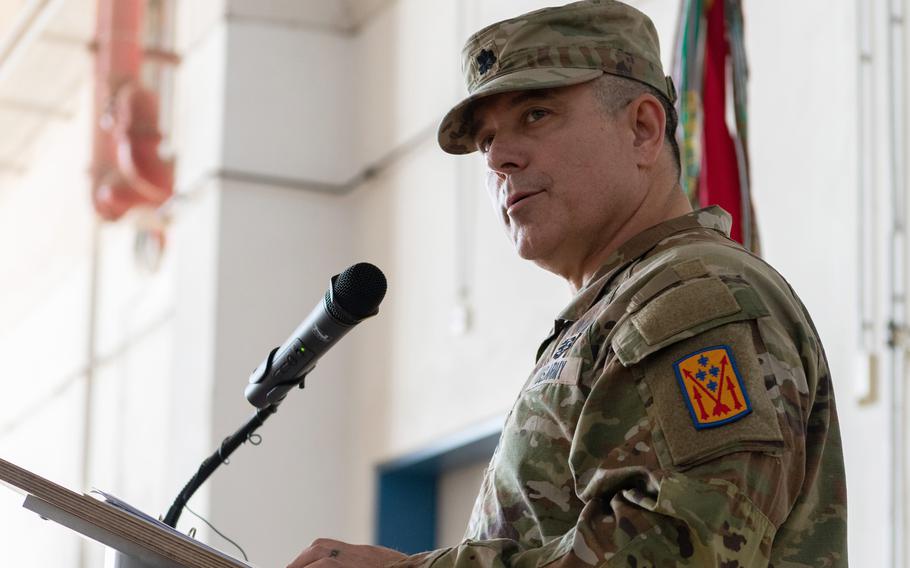 Army Lt. Col. Eric Ackles speaks at the 1st Battalion, 57th Air Defense Artillery Regiment’s reactivation ceremony Oct. 4, 2023, at Katterbach Kaserne in Ansbach, Germany. Ackles was fired as the unit’s commander on April 22, due to what the Army said was a loss of trust and confidence in his ability to command. 