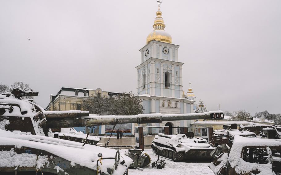 Snow covers an exhibit of destroyed Russian military equipment and vehicles in Kyiv, Ukraine.