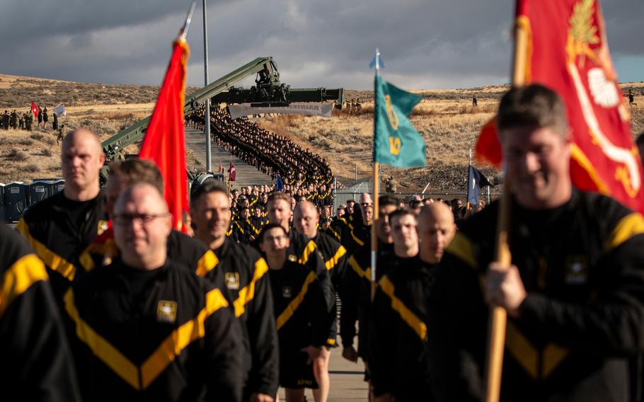 U.S. Soldiers with the Washington National Guard participate in the first-ever Rainier Stampede at Yakima Training Center, Wash., on Nov. 5, 2022. All units throughout Washington State gathered together for a three-mile run led by Brig. Gen. Daniel Dent, assistant adjutant general of the Washington National Guard, and various activities.