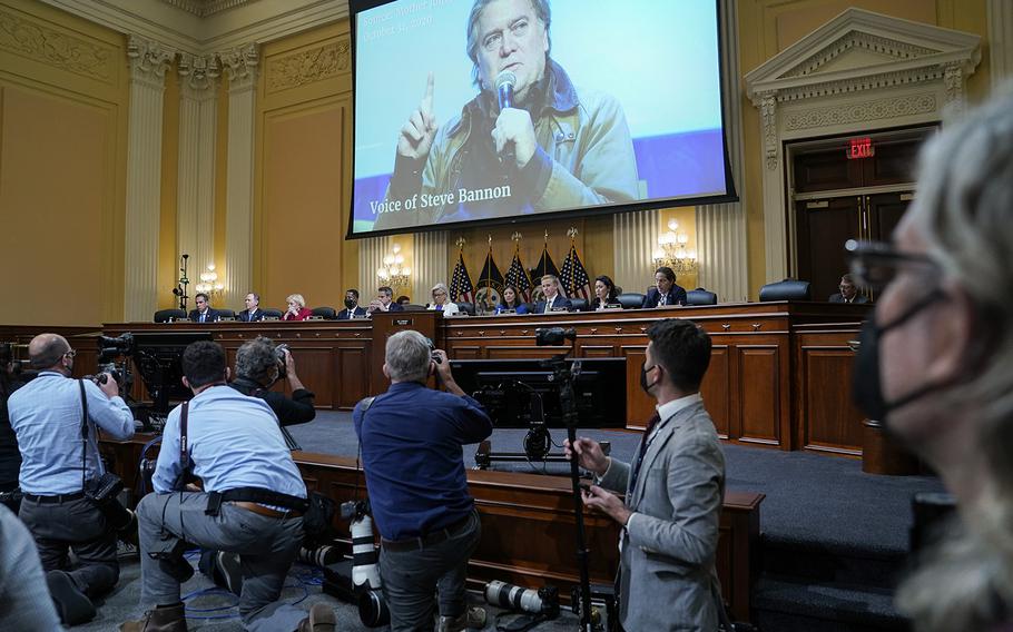 Stephen K. Bannon is seen on the screen during a hearing by the House select committee investigating the Jan. 6, 2021, attack on the U.S. Capitol. 