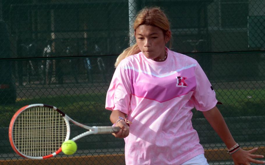 Qiana Fowler is one of three senior returners on Nile C. Kinnick's tennis team.