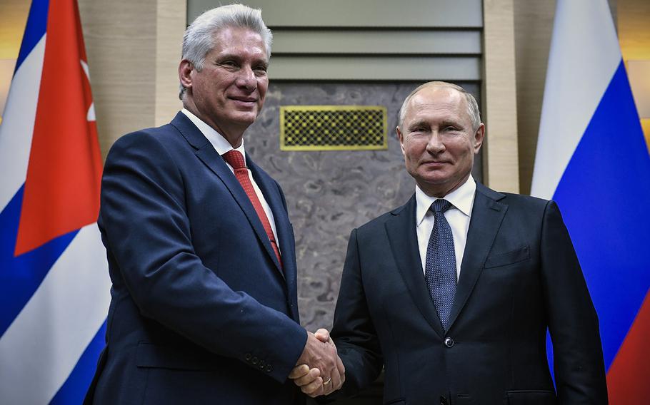 Russian President Vladimir Putin meets with his Cuban counterpart Miguel Diaz-Canel at the Novo-Ogaryovo state residence outside Moscow on Oct. 29, 2019. (Alexander Nemenov/Pool/AFP via Getty Images/TNS)