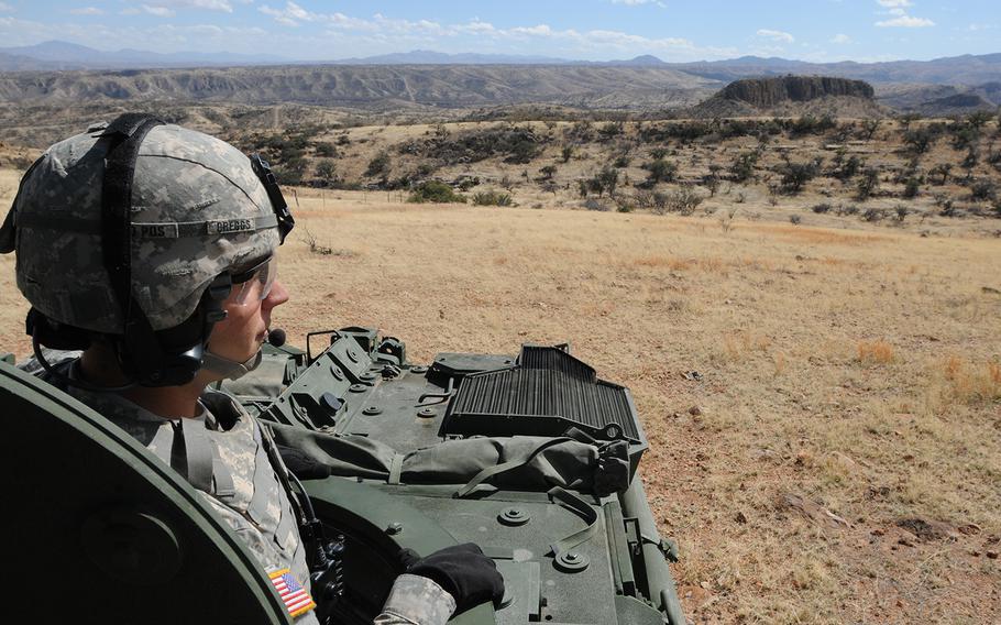 A soldier from the 1st Armored Division, Fort Bliss, Texas, conducts observations along the U.S.-Mexico border near Nogales, Ariz., on Feb. 27, 2019. U.S. Northern Command on Thursday, Jan. 13, 2022, launched an internal investigation into a wide range of alleged issues that have occurred among troops deployed on the federal mission along the border.