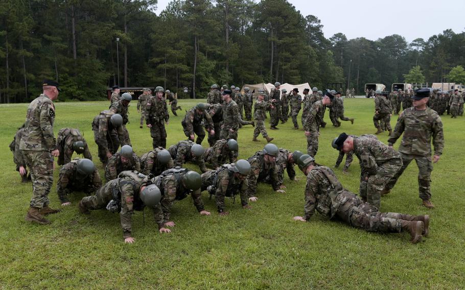 U.S. Army National Guard Soldiers perform push-ups during Phase 1 of Officer Candidate School conducted by 2nd Battalion (OCS), 218th Regional Training Institute, South Carolina National Guard, at McCrady Training Center in Eastover, S.C., June 5, 2021. 