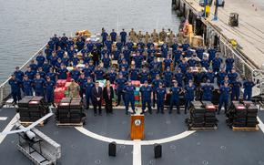 Crew members from the U.S. Coast Guard Cutter Munro (WMSL 755) offloads 33,768 pounds of cocaine, in San Diego, May 28, 2024. The drugs, worth an estimated $468 million, were seized in international waters of the Eastern Pacific Ocean. (U.S. Coast Guard photo by Petty Officer 3rd Class Hunter Schnabel)