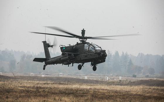 Soldiers assigned to 1-229 Attack Battalion, 16th Combat Aviation Brigade refuel, rearm, and repair AH-64E Apache attack helicopters and other vehicles at the Forward Arming and Refueling Point on Joint Base Lewis-McChord, Wash., Oct. 20, 2022. (U.S. Army photo by Sgt. Ashunteia' Smith)