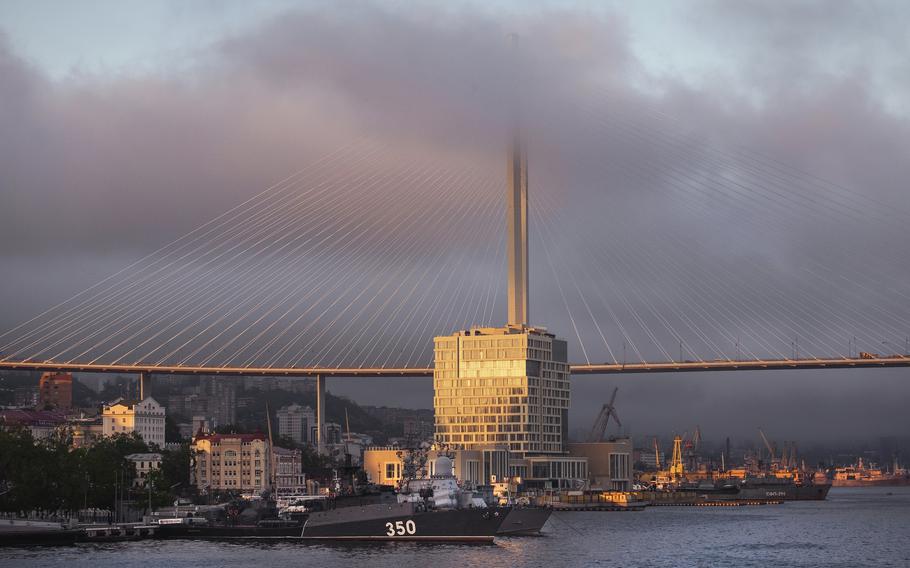 The sun sets in the Russian port city of Vladivostok, Russia, on May 30, 2021.