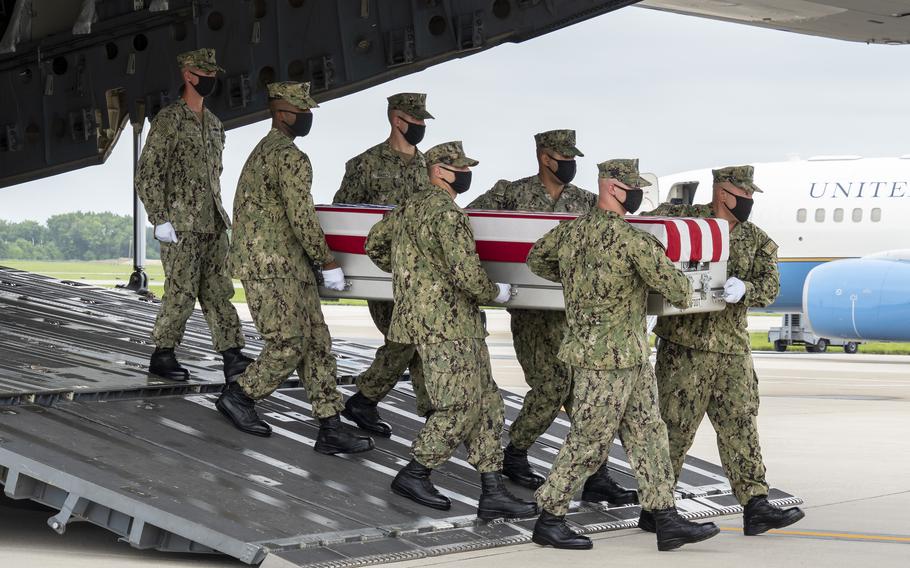 A U.S. Navy carry team transfers the remains of Navy Hospitalman Maxton W. Soviak of Berlin Heights, Ohio, Aug. 29, 2021 at Dover Air Force Base, Delaware. Soviak was assigned to 1st Marine Regiment, 1st Marine Division, Camp Pendleton, Calif.