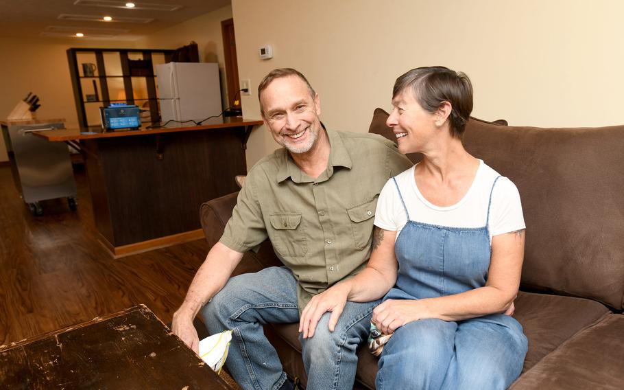 Ken and Angel Perkins of North Canton are seated in one of the two apartments they plan to offer to Afghan refugees in need of temporary housing. Angel Perkins is a retired nurse and chef. Ken Perkins is retired from the U.S. Air Force.