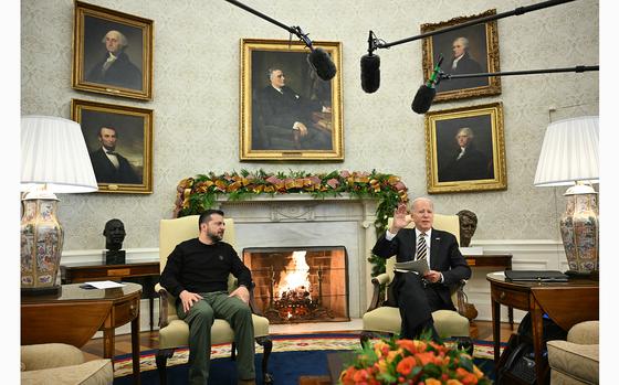 US President Joe Biden (R) speaks to the press as he meets with Ukrainian President Volodymyr Zelensky in the Oval Office of the White House in Washington, DC, on Dec. 12, 2023. (Mandel Ngan/AFP/Getty Images/TNS)