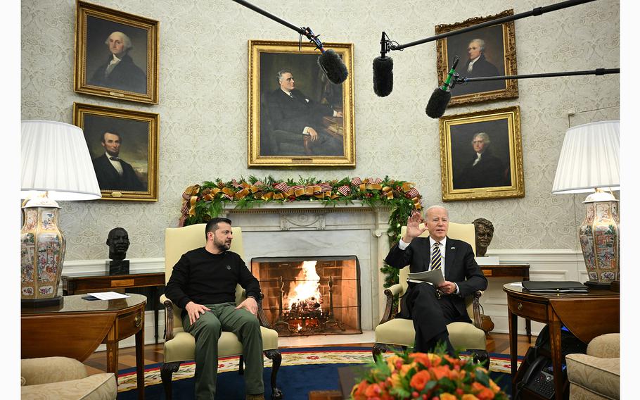 US President Joe Biden meets with Ukrainian President Volodymyr Zelensky in the Oval Office of the White House in Washington, DC, on Dec. 12, 2023. 