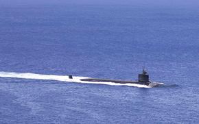 The nuclear powered fast-attack submarine USS Seawolf sails into Apra Harbor, outside of Naval Base Guam, in 2022. The Navy is conducting new training for many medical providers related to radiation examinations for service members. 