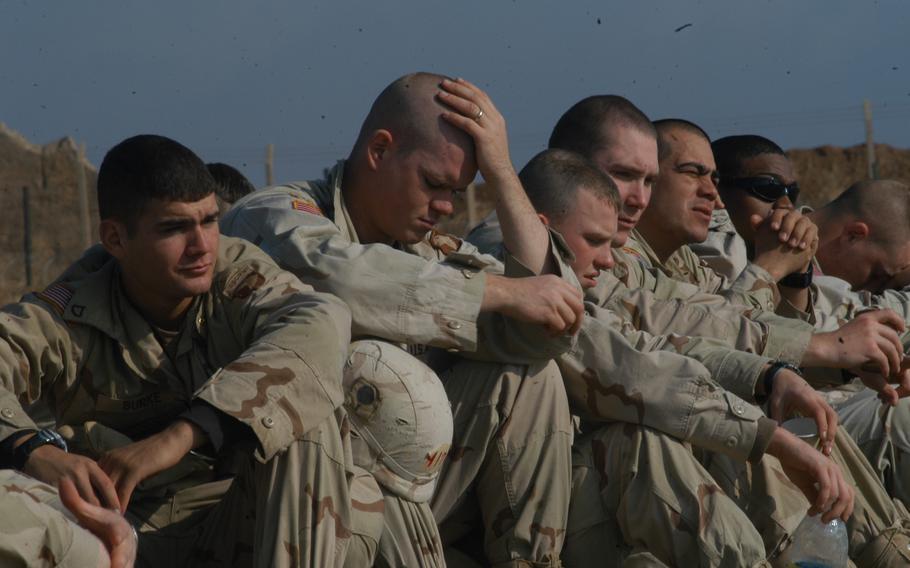 Soldiers attending the 101st Airborne Division’s air assault school at Qayyarah West Air Field in northern Iraq look a bit fatigued after a morning of rappelling.