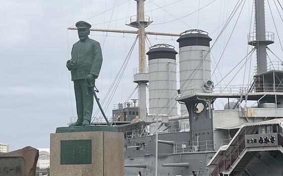 A statue of Adm. Togo Heihachiro, who rode the HMJMS Mikasa to victory in the Battle of Tsushima Strait, stands near the ship in Yokosuka, Japan.