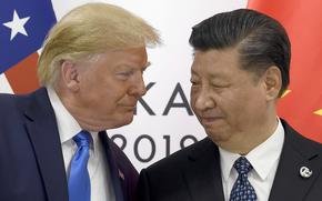 FILE - U.S. President Donald Trump, left, meets with Chinese President Xi Jinping during a meeting on the sidelines of the G-20 summit in Osaka, Japan,  June 29, 2019. (AP Photo/Susan Walsh, File)