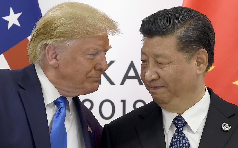 President Donald Trump looking at President Xi Jinping.