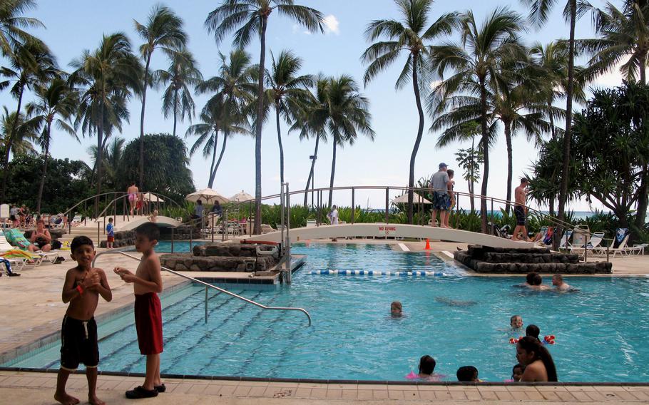 Pools at the Hale Koa Hotel beckon service members and their families enjoying the Hawaiian sunshine along the shores of Waikiki Beach. Because of the coronavirus pandemic, the Air Force is letting members accrue up to two months of extra leave to use over the next three years.