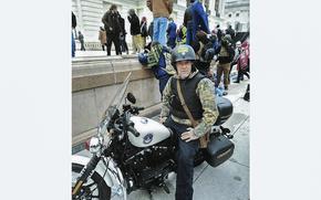 William Frederick Beals II of Ringgold, Georgia, sits atop a U.S. Capitol Police motorcycle in a photo included as part of an FBI affidavit. Beals was arrested for participating in the Jan. 6, 2021, U.S. Capitol riot. (U.S. Department of Justice/TNS)