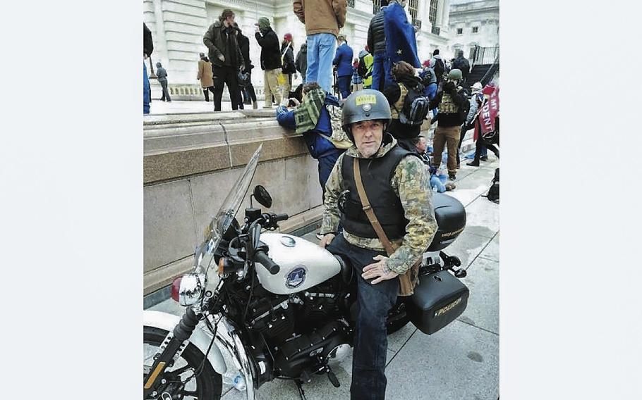 William Frederick Beals II of Ringgold, Georgia, sits atop a U.S. Capitol Police motorcycle in a photo included as part of an FBI affidavit. Beals was arrested for participating in the Jan. 6, 2021, U.S. Capitol riot. 