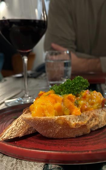 The pumpkin bruschetta at Das Notstain in Amberg, Germany, is perfect for two people to share and comes with a delicious pumpkin mixture on ciabatta bread and a dash of pesto. 
