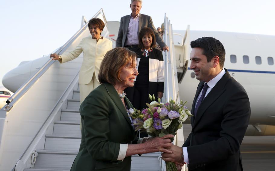 In this handout photo released by Armenian National Assembly via Photolure photo agency, Head of Armenian National Assembly Alen Simonyan, right, welcomes U.S. House of Representatives Nancy Pelosi upon her arrival at the International Airport outside of Yerevan, Armenia, Saturday, Sept. 17, 2022. A US Congressional delegation headed by Speaker of the House Nancy Pelosi arrived Saturday in Armenian, where a cease-fire has held for three days after an outburst of fighting with neighboring Azerbaijan that killed more than 200 troops from both sides.