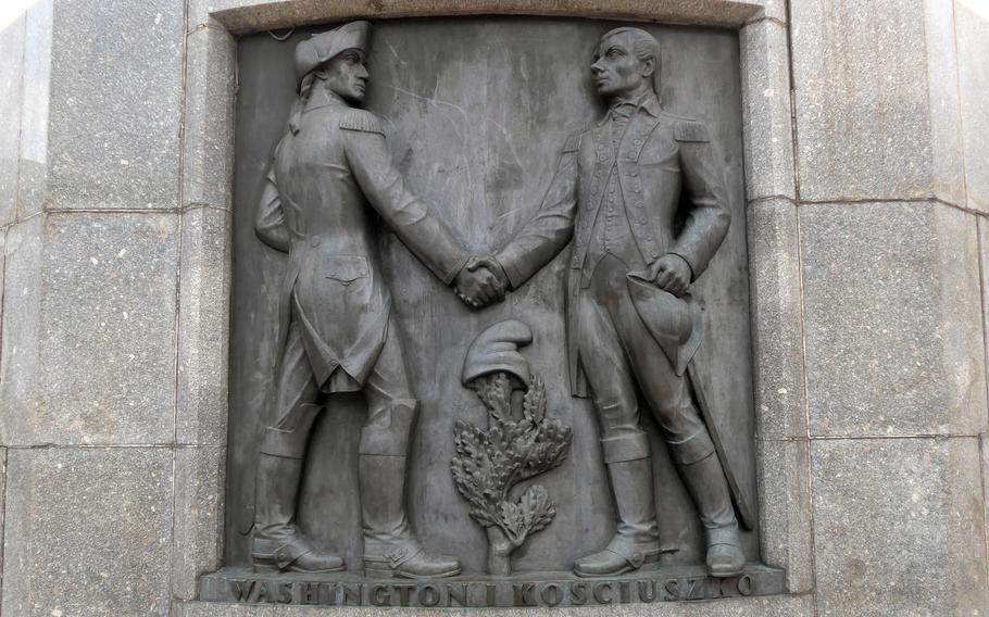 At the Thaddeus Kosciuszko Monument in Lodz, Poland, the Polish hero, right, shakes hands with George Washington. Kosciuszko fought with the Continental Army during the Revolutionary War, and as an architect oversaw the construction of American fortifications. The American post in Poznan is to be renamed Camp Kosciuszko.