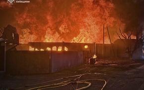 This photo provided by the Ukrainian Emergency Service shows a fire following a Russian attack in Kyiv region, Ukraine, Wednesday, July 9, 2025. (Ukrainian Emergency Service via AP)