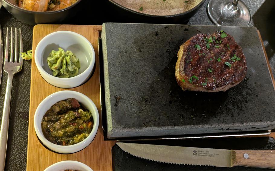 The Argentine steak is served with a three sauces. 