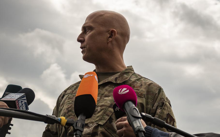 Brig. Gen. Joshua Olson, commander of the 86th Airlift Wing, speaks to reporters at Ramstein Air Base, Germany, on Aug. 30, 2021. Thousands of Afghans who fled Taliban rule are living in temporary tents and facilities at the base, as they await flights to the United States. 
