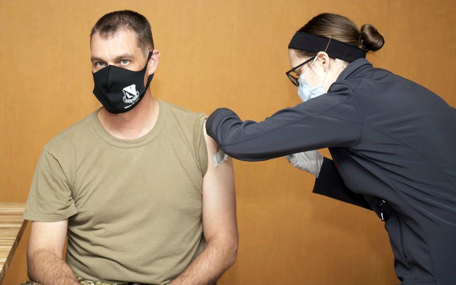 Col. Andrew Campbell, 374th Airlift Wing commander, receives the Moderna COVID-19 vaccine at Yokota Air Base, Japan, Jan. 12, 2021. 