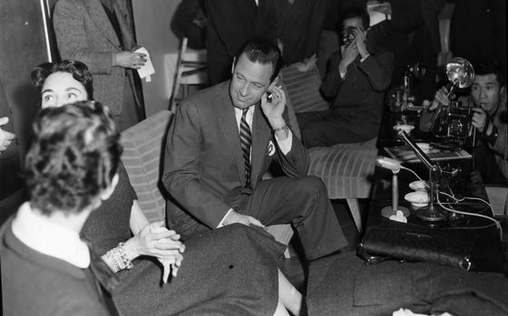 Love (and hate) is a many splendored thing, 1955

Tokyo, Japan, Feb. 1, 1955: Actor William Holden listens to his future co-star Jennifer Jones as she answers a question from a reporter. The pair stopped in Tokyo on their way to Hong Kong to film “Love is a Many-Splendored Thing,” the movie-adaptation of Han Suyin’s semi-autobiographical novel. Jennifer Jones will play the part of the widowed Dr. Han Suyin who falls in love with American newspaper reporter Mark Elliot (played by Holden). 

Despite the sultry look Holden seems to cast upon Jones - and the chemistry the pair had on screen - the two had a contentious relationship on set during the filming of the movie. Holden was joined on this trip by his wife, Ardis Ankerson (stage name Brenda Marshall), seated to Jones' right. 

Looking for Stars and Stripes’ historic coverage? Subscribe to Stars and Stripes’ historic newspaper archive! We have digitized our 1948-1999 European and Pacific editions, as well as several of our WWII editions and made them available online through https://starsandstripes.newspaperarchive.com/

META TAGS: entertainment; actor; movie industry; celebrity; press conference; photographer; journalist