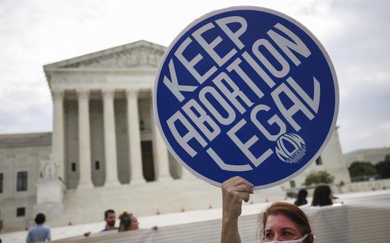 Pro-choice activists demonstrate outside the Supreme Court on Oct. 4, 2021, in Washington, D.C. (Kevin Dietsch/Getty Images/TNS)