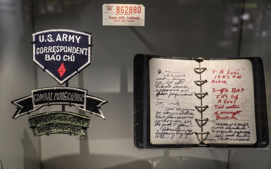 Combat journalists' patches and notebook at the National Museum of the United States Army on its reopening day, June 14, 2021.